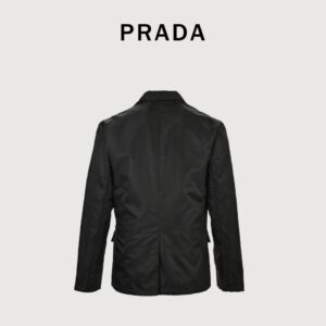 Prada PRD Nylon Casual Suit was originally purchased at Taikoo Hui 22500 Guangzhou, Prada's sustainable recycled nylon series, the product is made of recycled ECONYL@ fabrics, and the density is very thick, which is different from the all-polyester material on the market. Despite its high strength and abrasion resistance, nylon fabric still maintains a light and soft feel, and is also the most characteristic fabric of Prada, Prada nylon suits focus on simplicity without losing a sense of fashion, with smooth lines and well-fitted cuts, which can well show the wearer's figure and temperament. At the same time, details such as the Prada brand's iconic triangle logo have also been subtly integrated into it, increasing the product's recognition and brand sense. Single-breasted suits are perfect for formal occasions such as business meetings, dinners, weddings, etc., due to their simplicity and elegance. At the same time, single-breasted suits also have a certain degree of casualness, which can be adapted to the wearing needs of casual occasions by matching different clothing and accessories. Size: 46 48 50 52